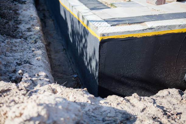 Professional Emergency Waterproofing technician working in Krakow, WI